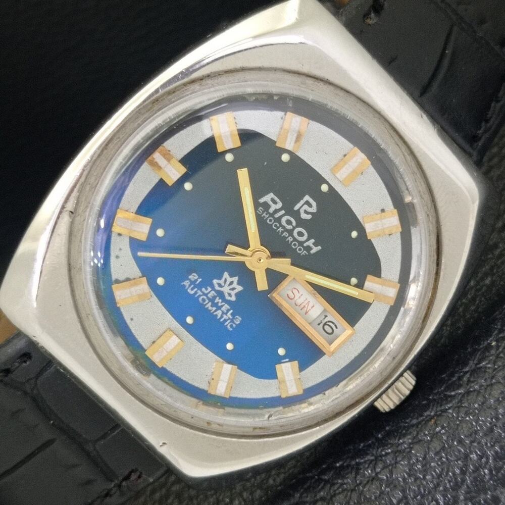 Vintage 1972 Ricoh Automatic Mens Silver Watch W/daydate & Blue accents